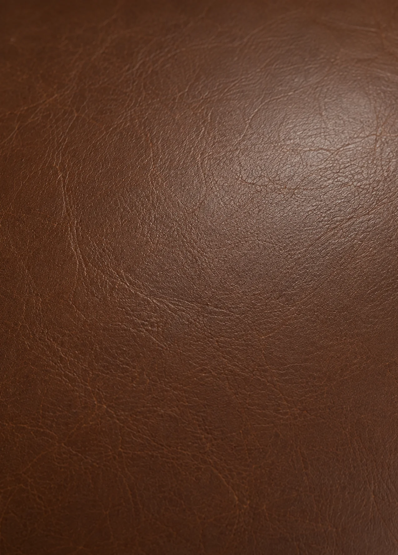 Semi-aniline leather hotel lounge seat during on-site commercial leather repair