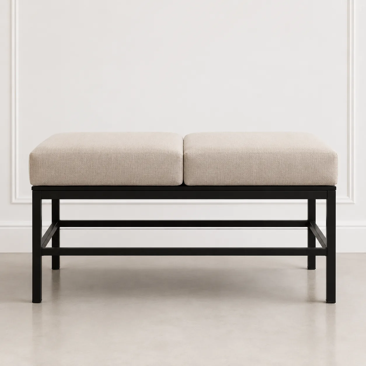 Long upholstered bench with black metal legs and a two-panel top cushion