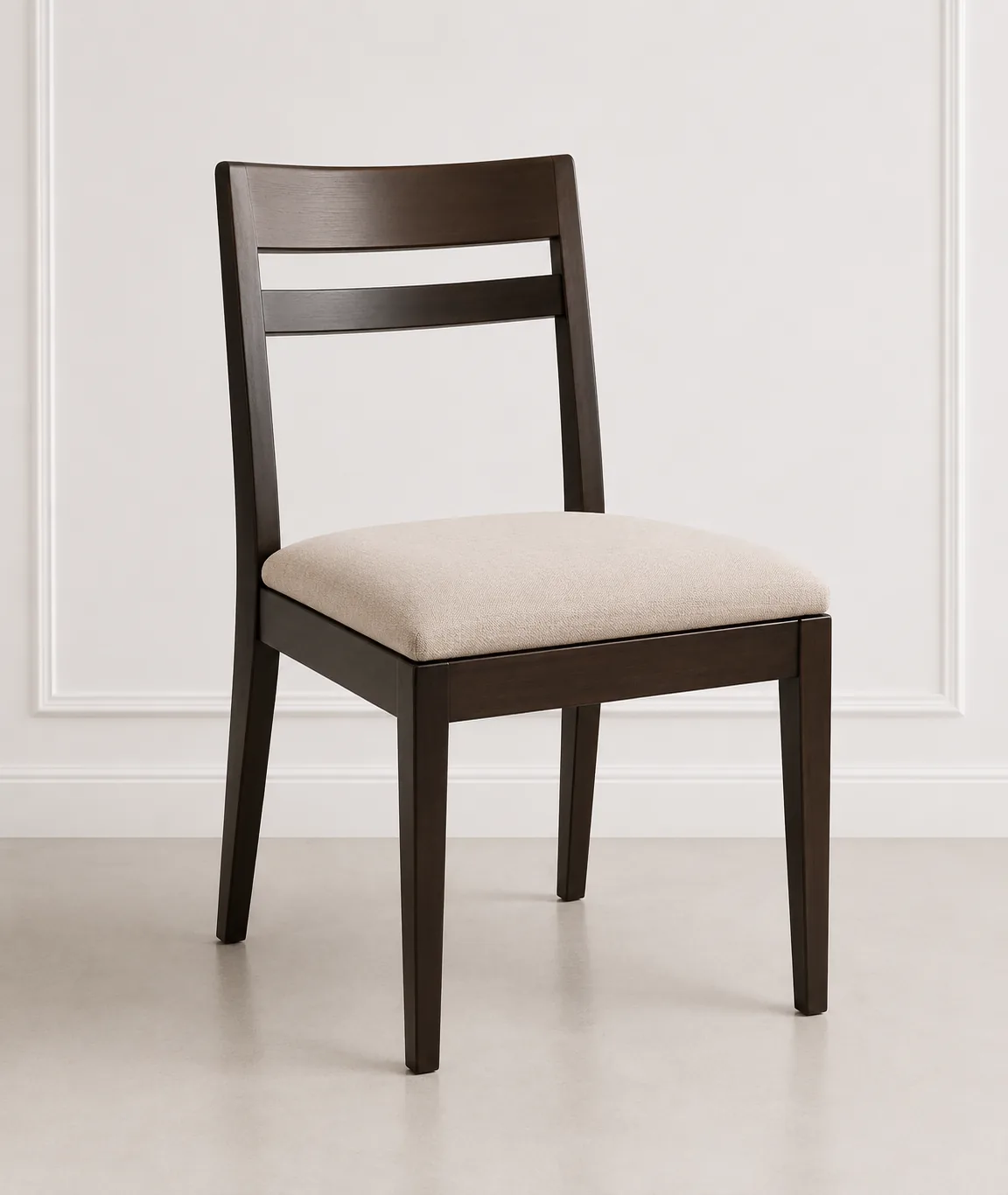 Dark wood dining chair with a pale fitted seat pad