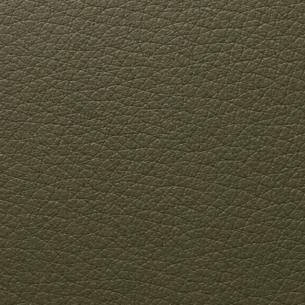 An olive eco leather swatch, a label applied to synthetics and to low-impact hide alike