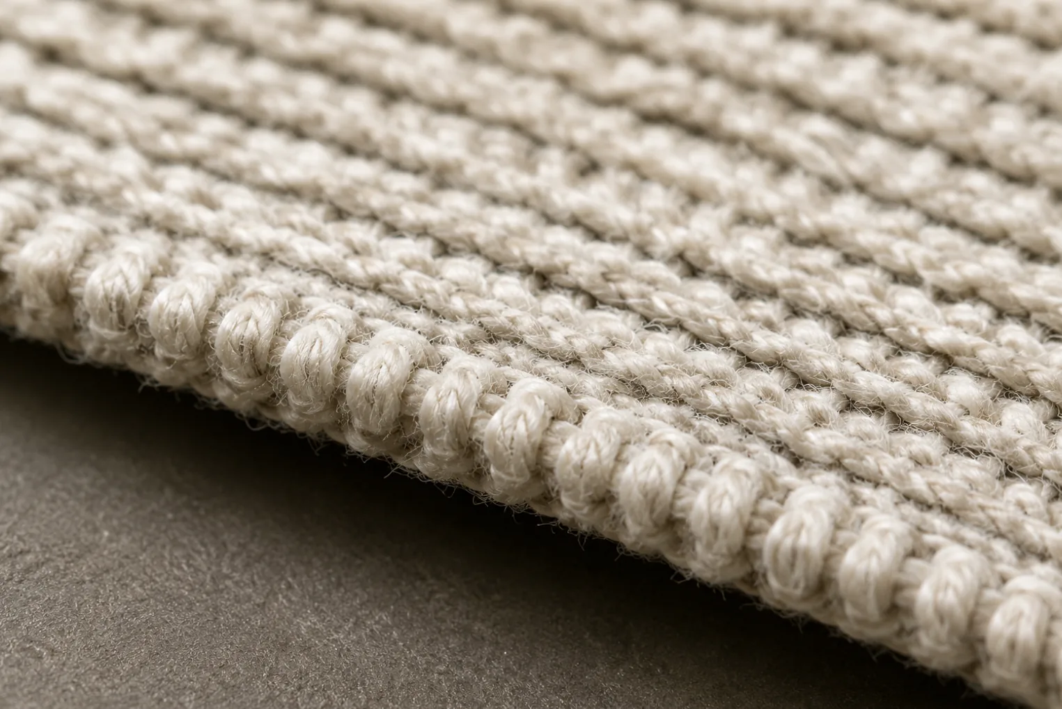 The knitted textile backing of faux leather, the woven structure that carries all the strength