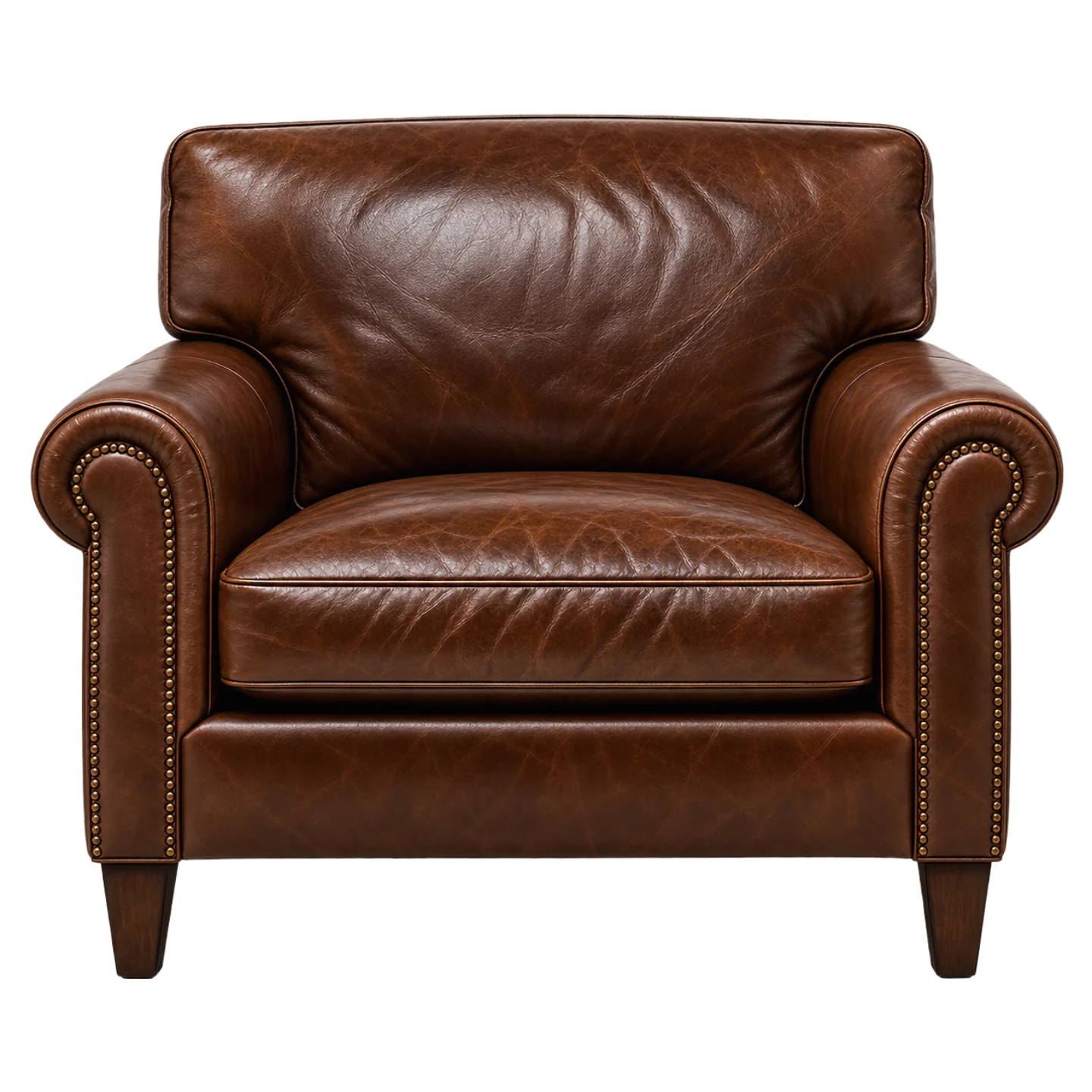 The same armchair with a mature patina: deep colour, high and low lights across the seat, and creasing that follows how it was sat in.