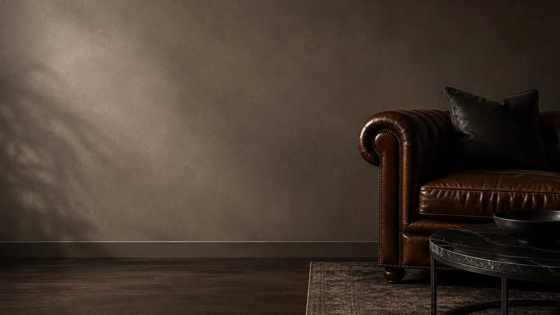 A restored leather sofa back in position in a New York City interior after delivery