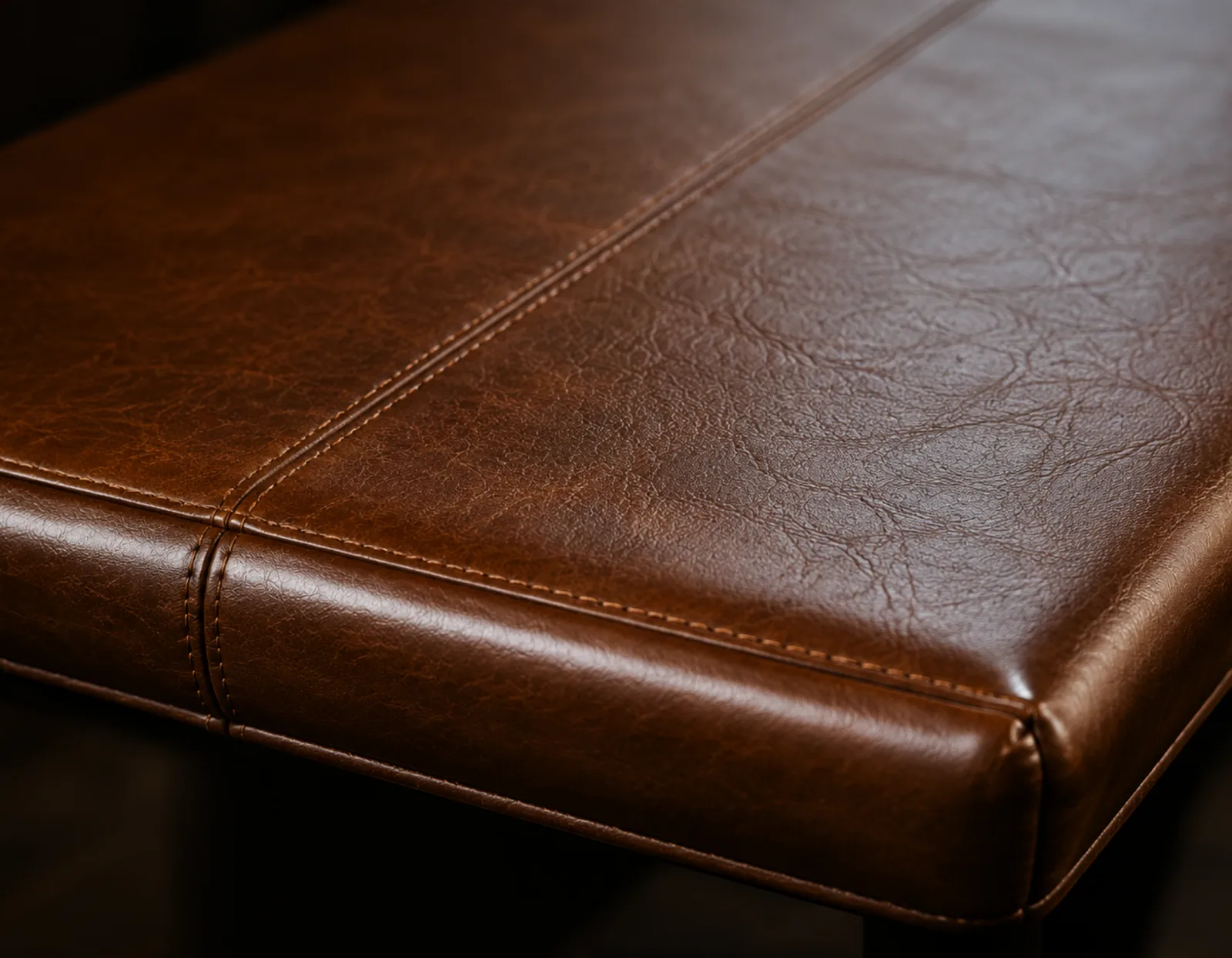 A repaired leather seat with the finish set, no longer marking on contact