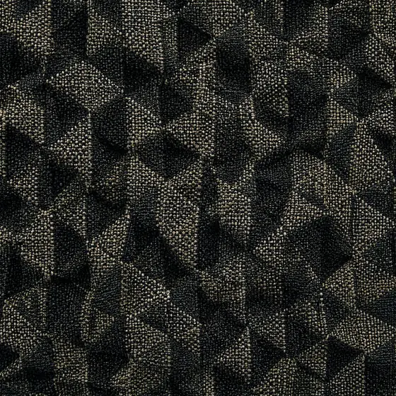 Macro swatch of dark patterned performance fabric woven for high-traffic hotel seating