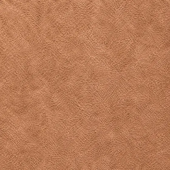 Macro swatch of tan suede with a soft raised nap, used on headboards and benches