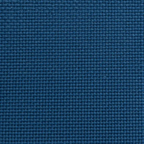 Macro swatch of blue basketweave upholstery fabric used on hotel lounge chairs