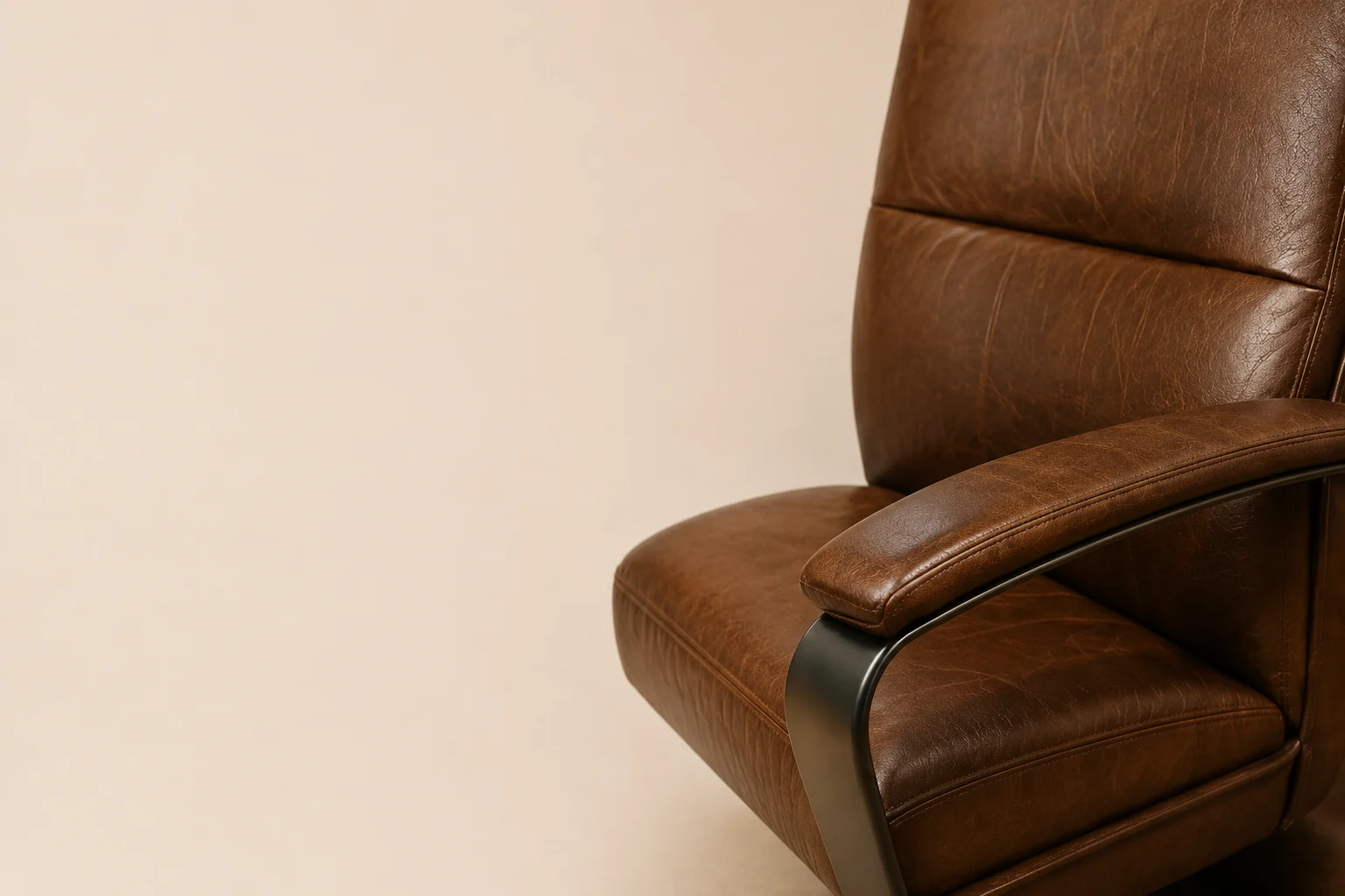 Executive chair being reupholstered in new leather