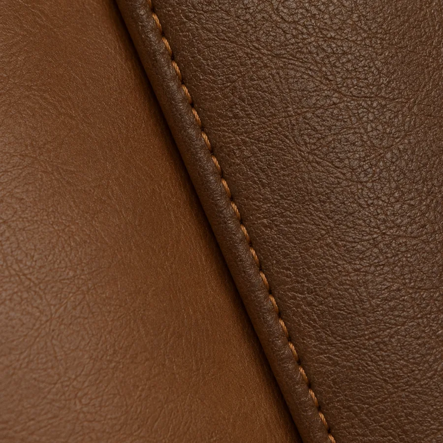 Cognac leather photographed at an angle, where the camera decides the colour and the sheen is lost