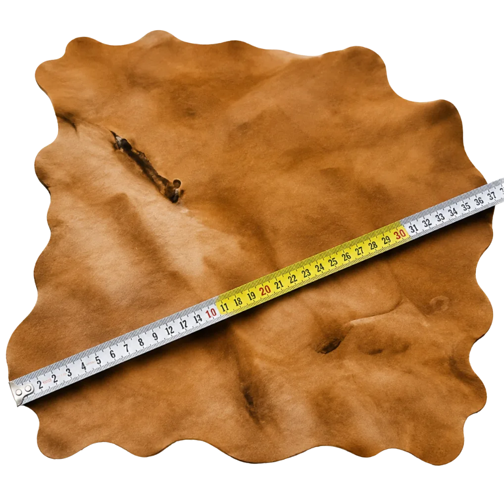 A tape measure laid diagonally across a full nubuck hide