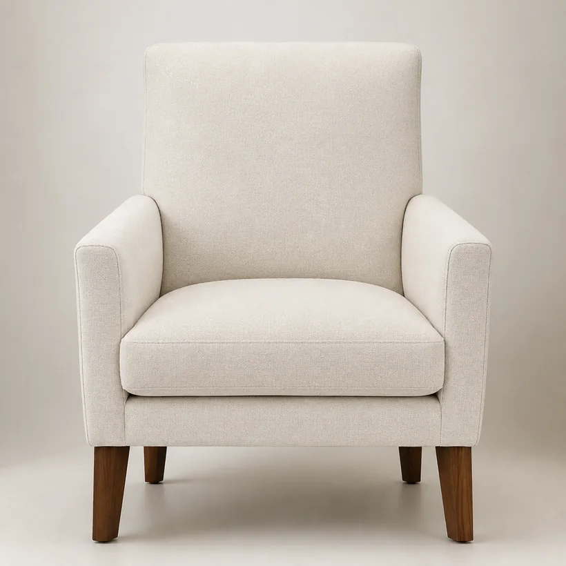 The same armchair covered in cream bouclé performance fabric