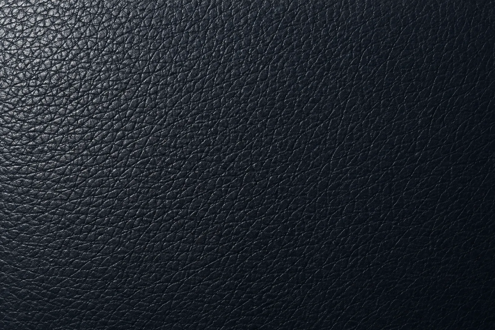 A pigmented leather swatch with an even, sealed surface
