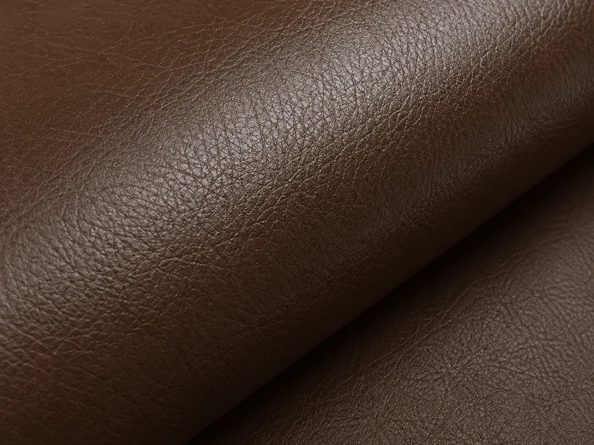 Faux leather upholstery material in dark brown for restaurant seating