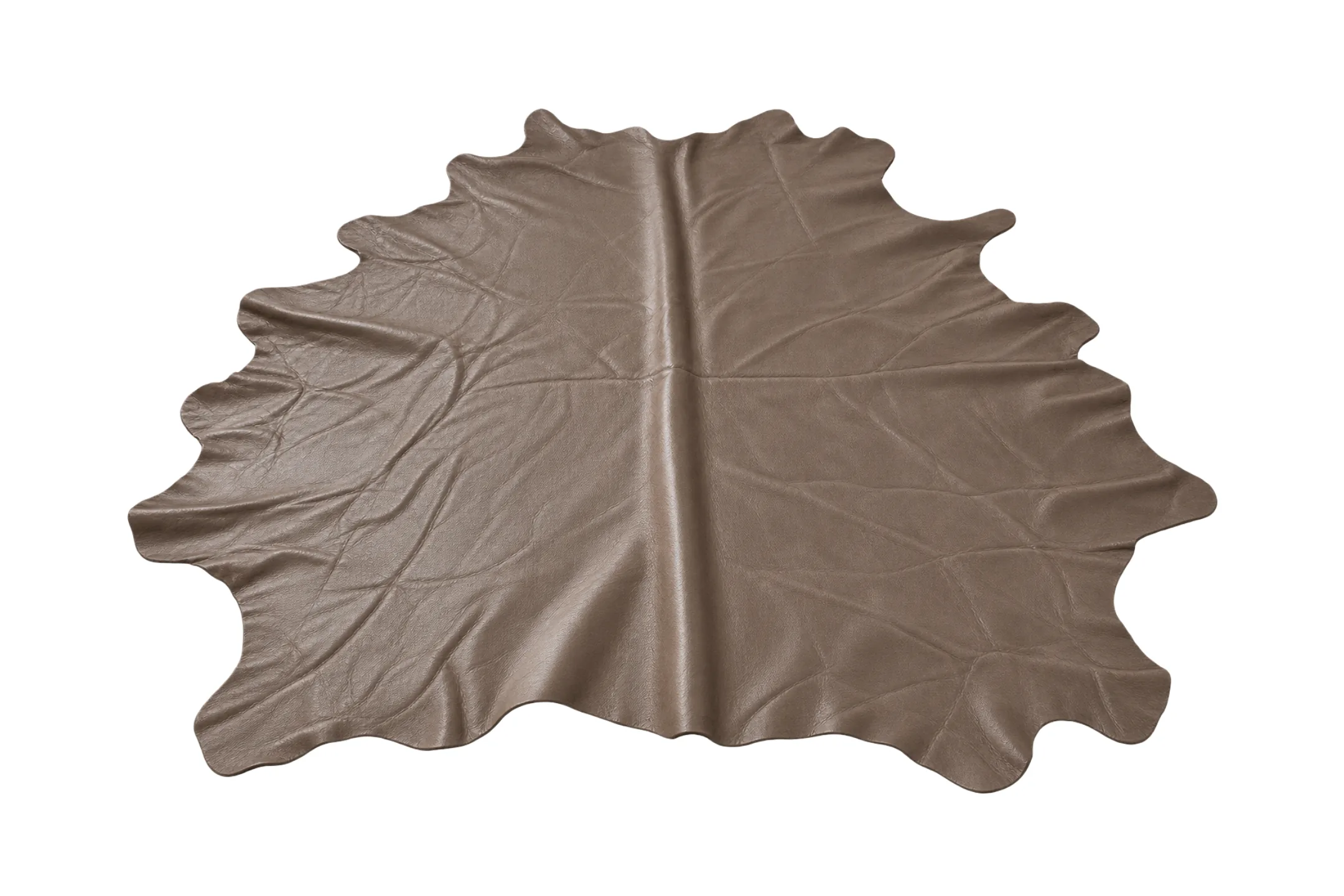 A full semi-aniline cowhide laid flat, showing the even taupe color the dye and light finish produce across the whole skin