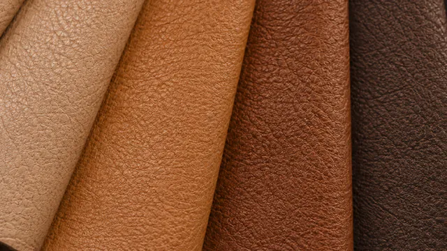 A fan of dyed leather swatches running from pale tan through to near-black