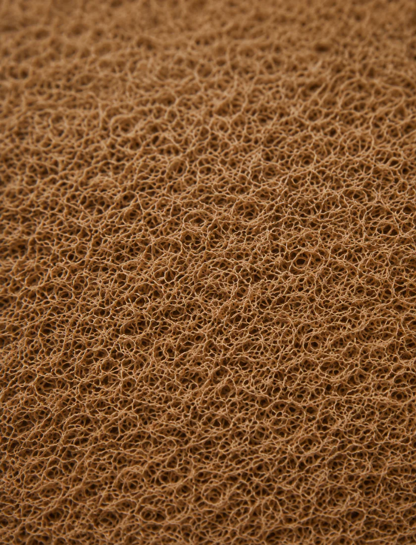 Macro of the inner split of a hide, openly fibrous with no pores and buffed into a nap