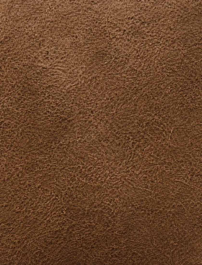 Suede swatch showing a longer, more fibrous nap with no grain structure