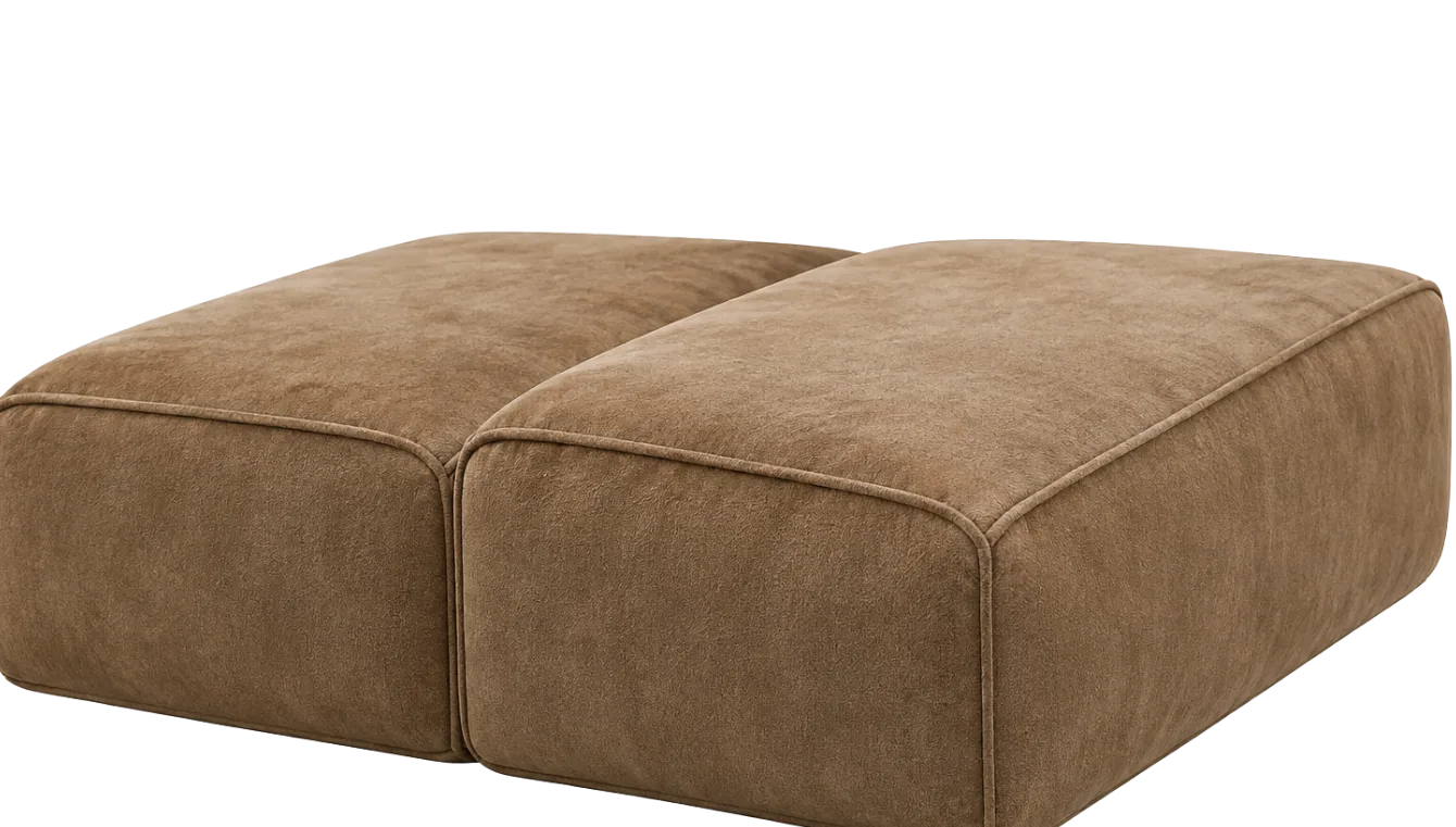 Two suede seat cushions on a sofa deck, the surface that takes constant pressure and body oil