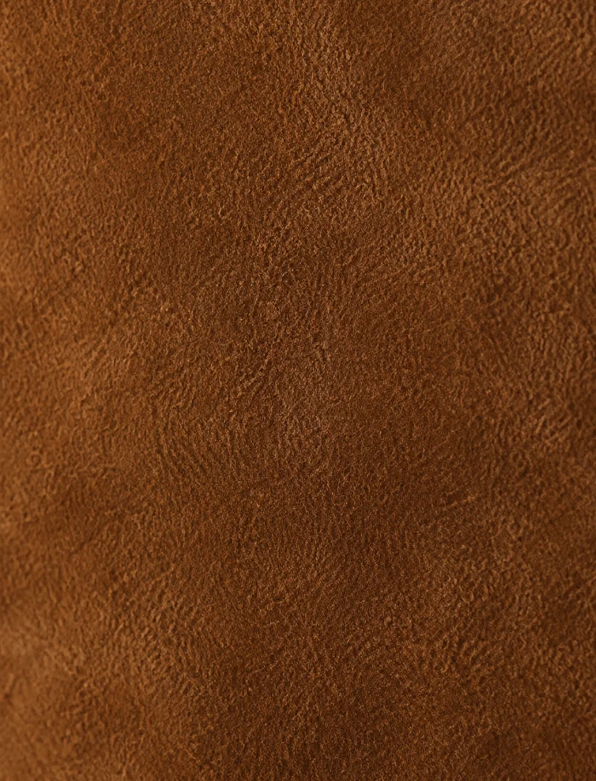 Macro of suede, the fibrous split surface raised into a deeper and more open nap