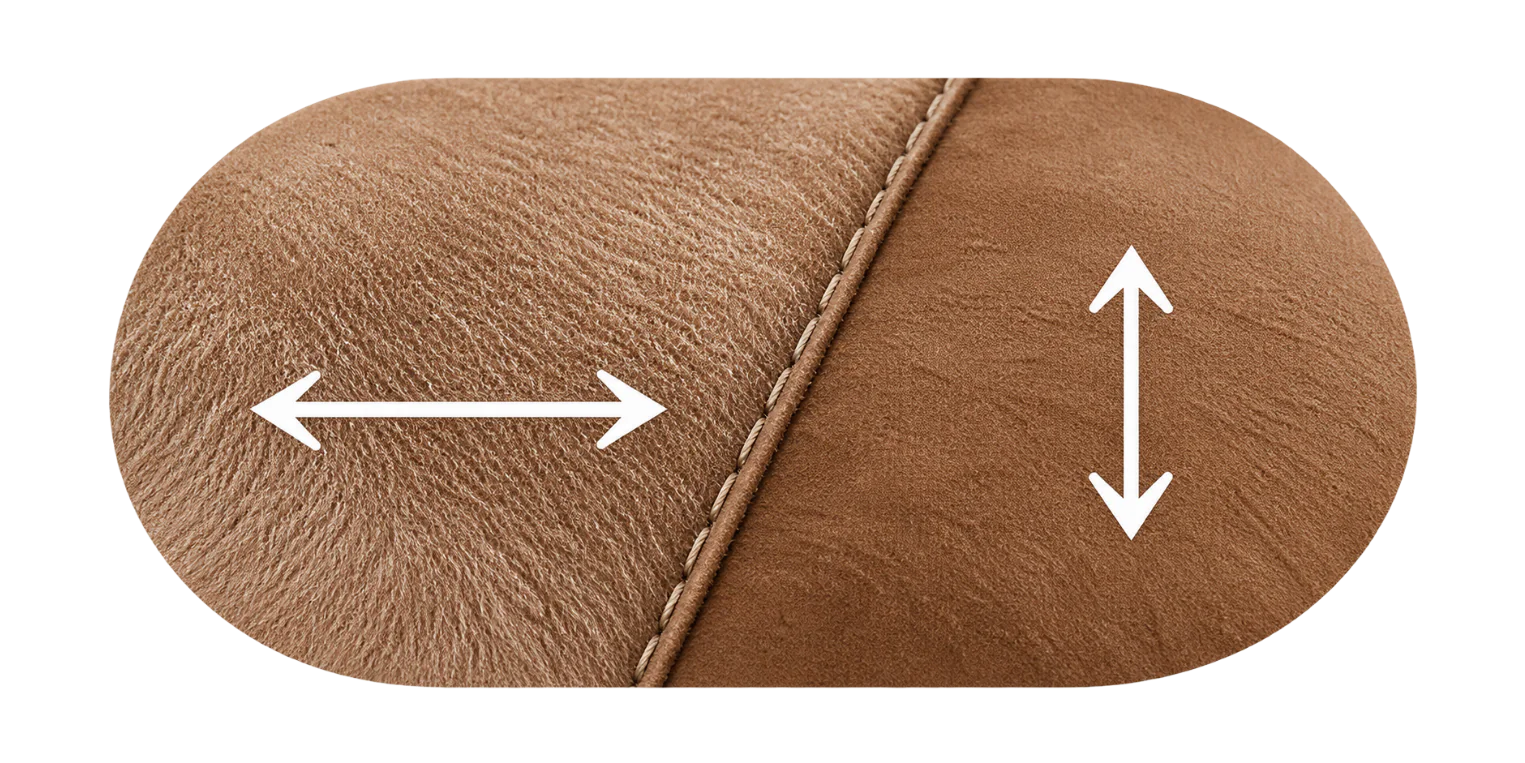 Real suede pulled two ways: the half stretched across the hide reads paler than the half stretched along it, so one panel shows two different shades