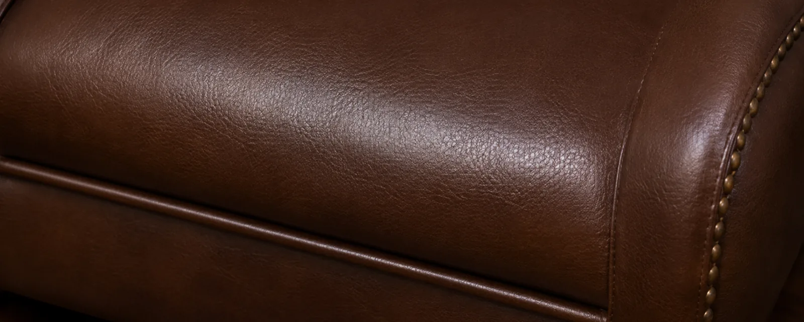 The same brown arm after the tear was filled, grained and recoloured, the repair invisible