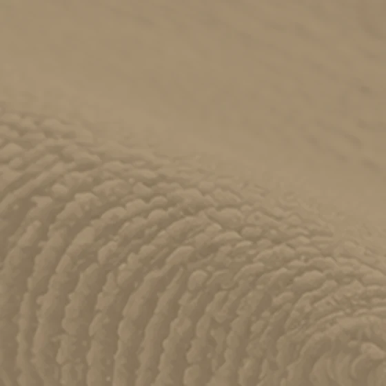 Chenille upholstery fabric texture in a mid taupe color