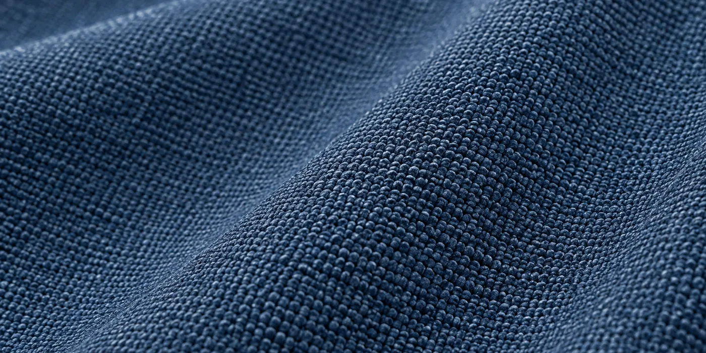 Macro view of navy solution-dyed acrylic upholstery fabric