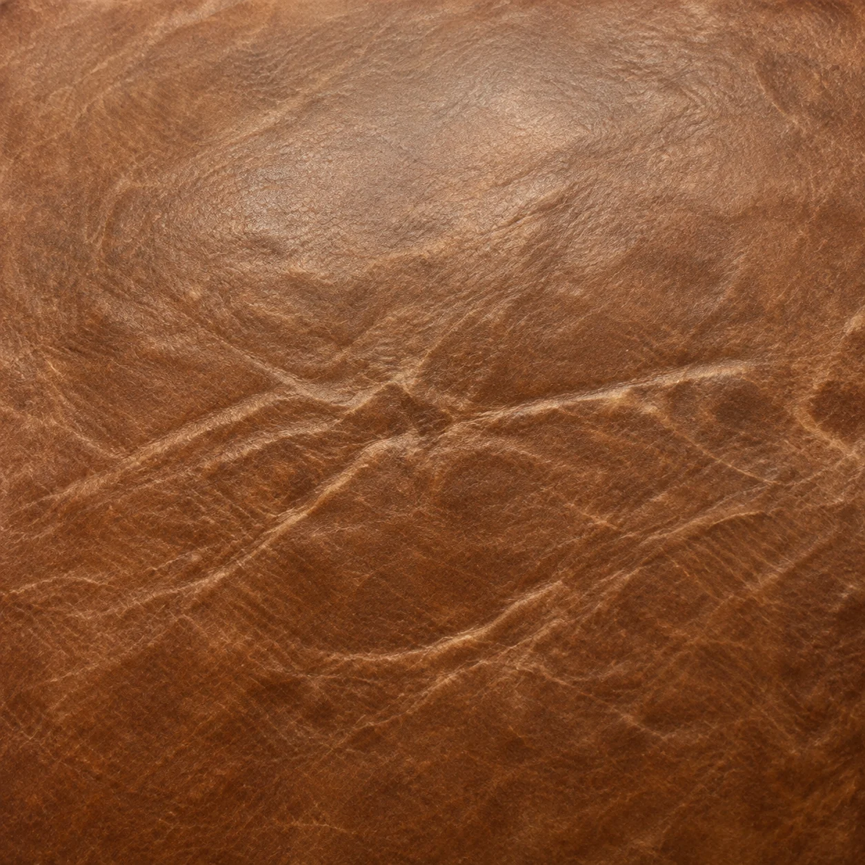 Waxed, hand-distressed leather with a pull-up patina