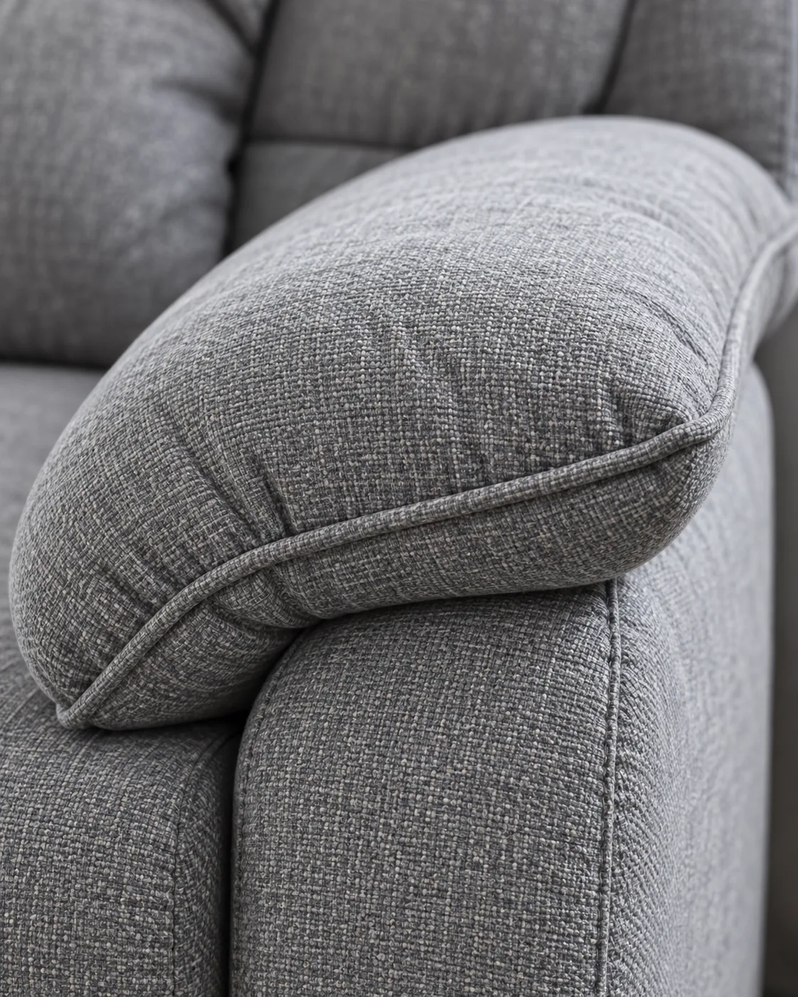 A soft grey pillow-top arm with a loose cushioned top