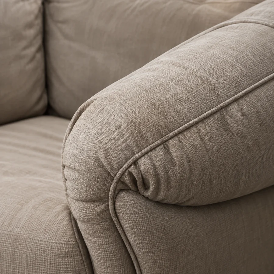 Sofa arm and back where the cushions are sewn to the frame rather than loose