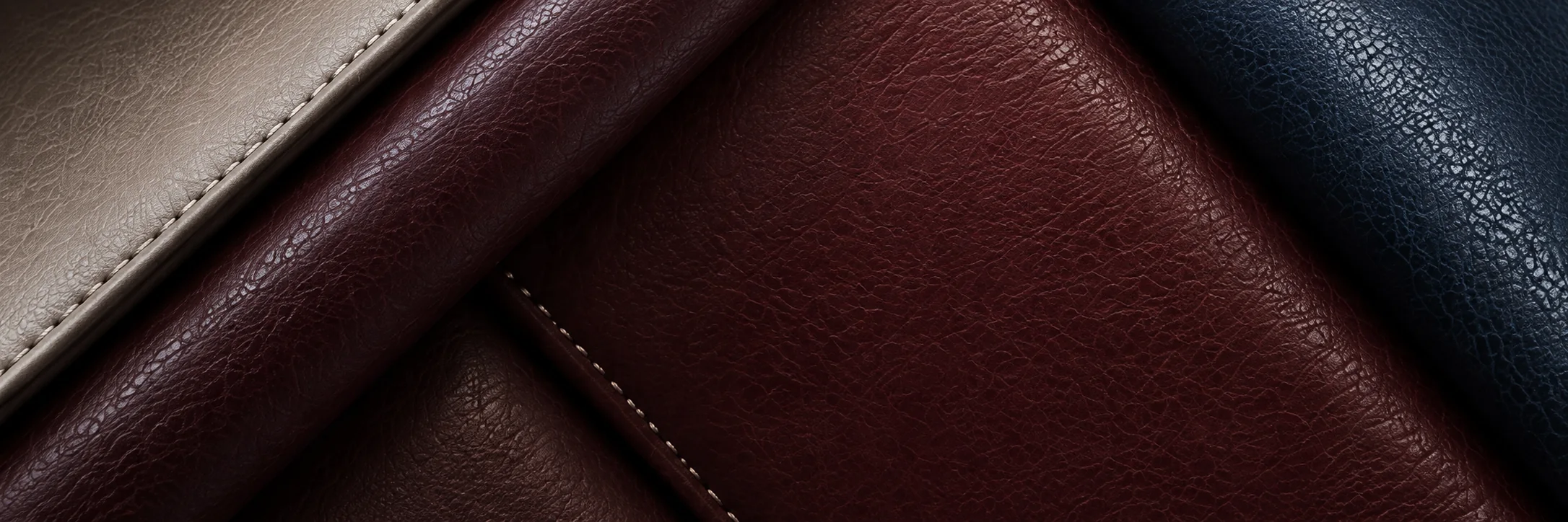Burgundy, taupe and navy leather panels overlapping