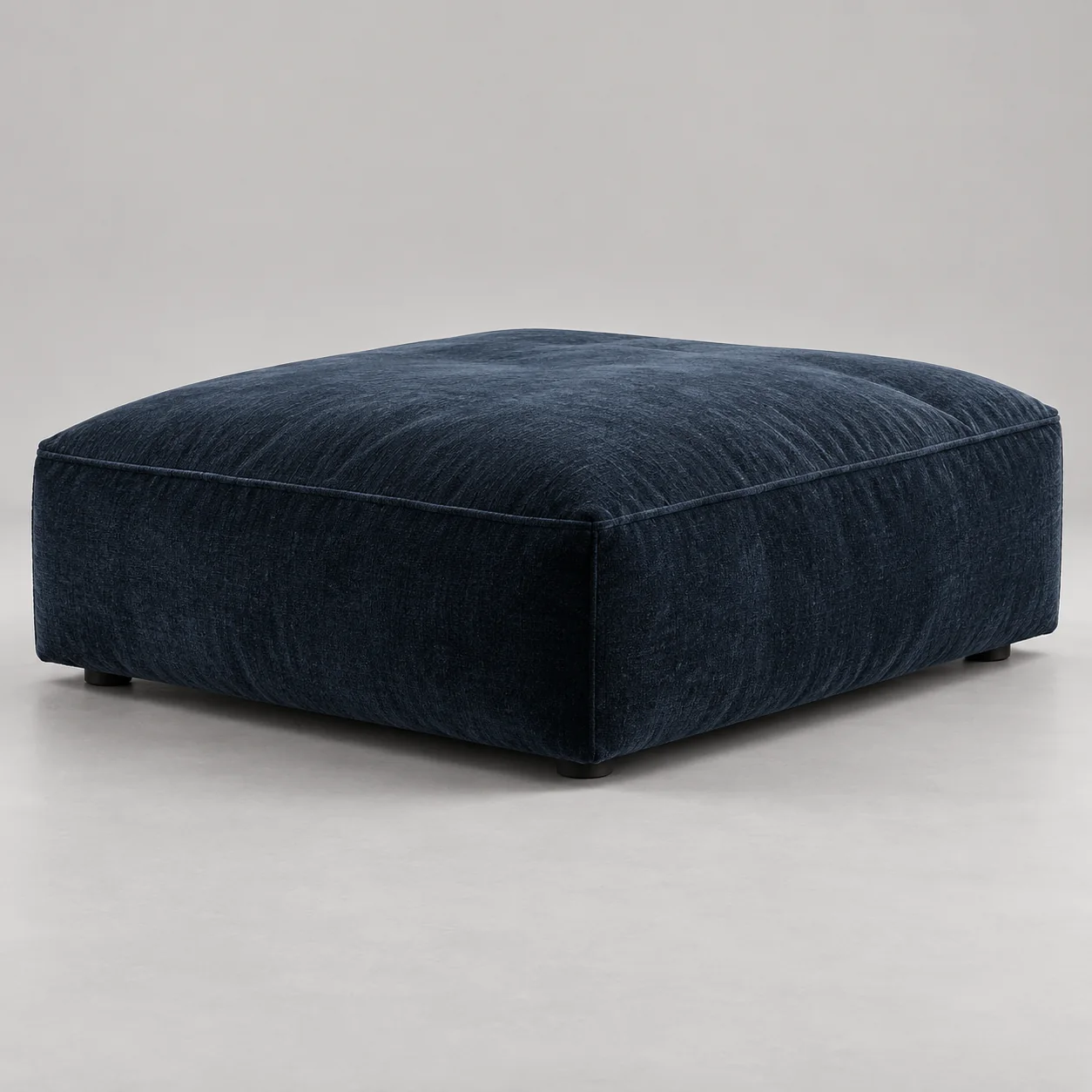 Deep navy upholstered square ottoman