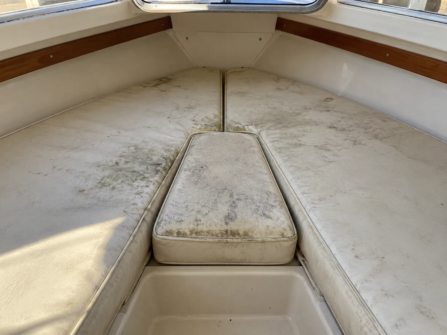 V-berth before the work, worn and faded