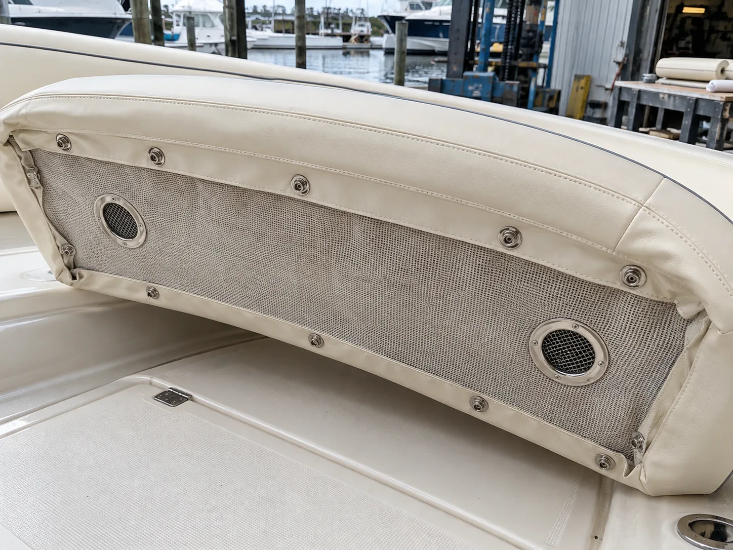 Stainless snaps and vent grommets set in a boat cushion underside