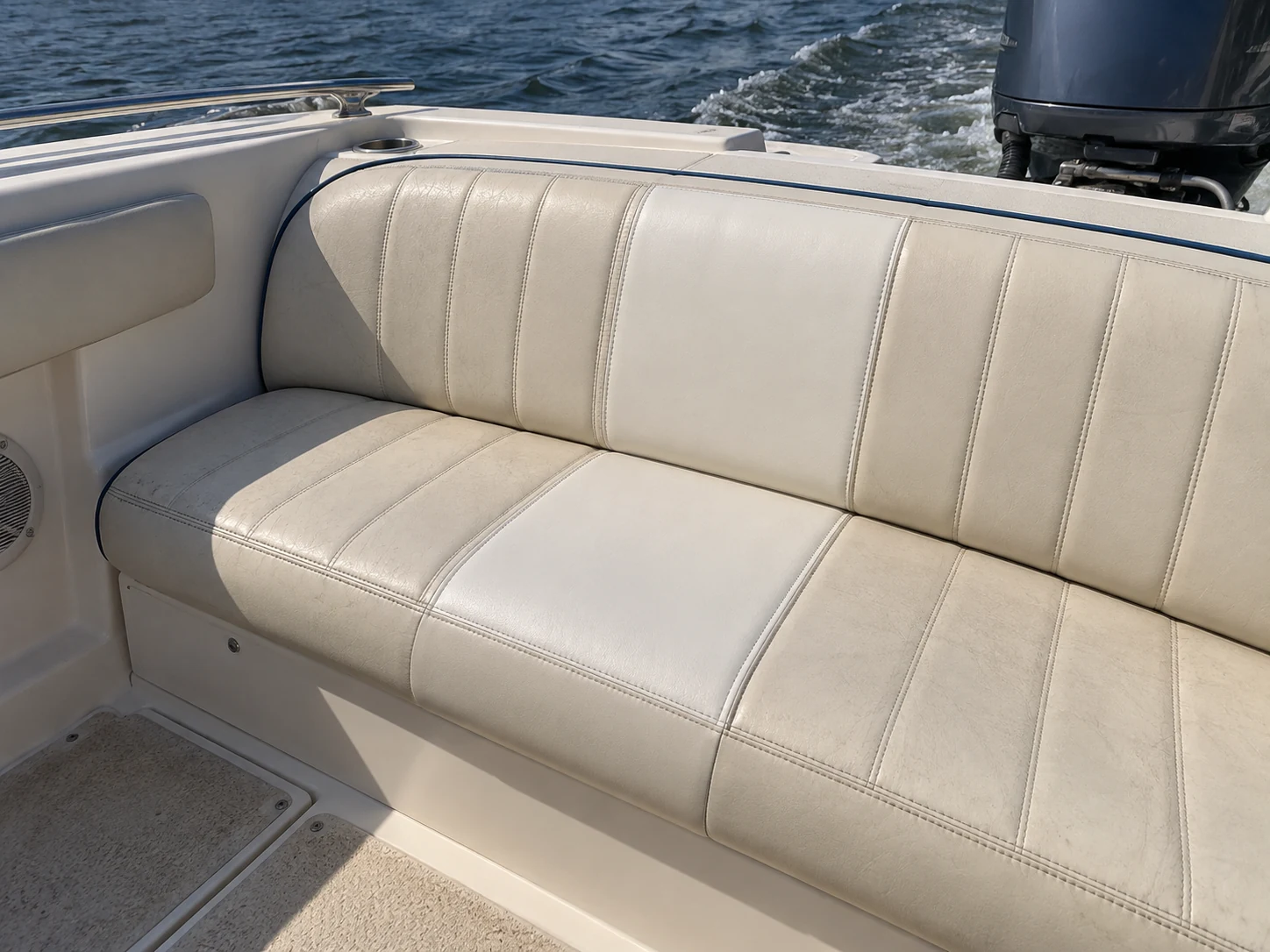One panel of a boat seat replaced in new vinyl