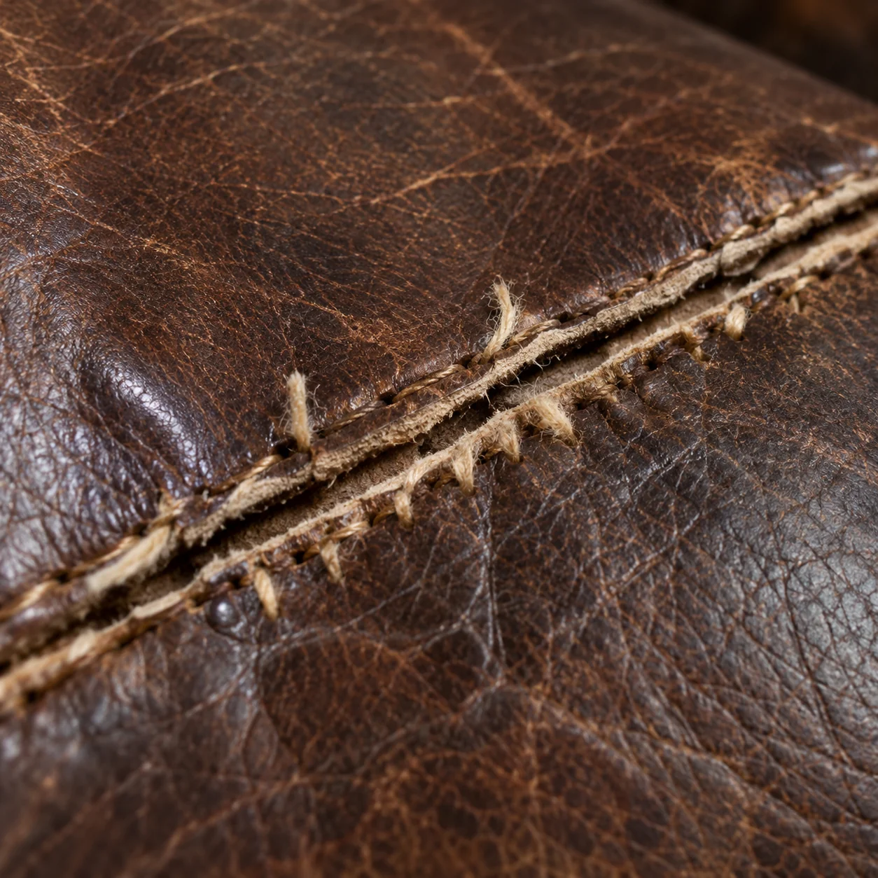 Broken stitching leaving an antique seam open