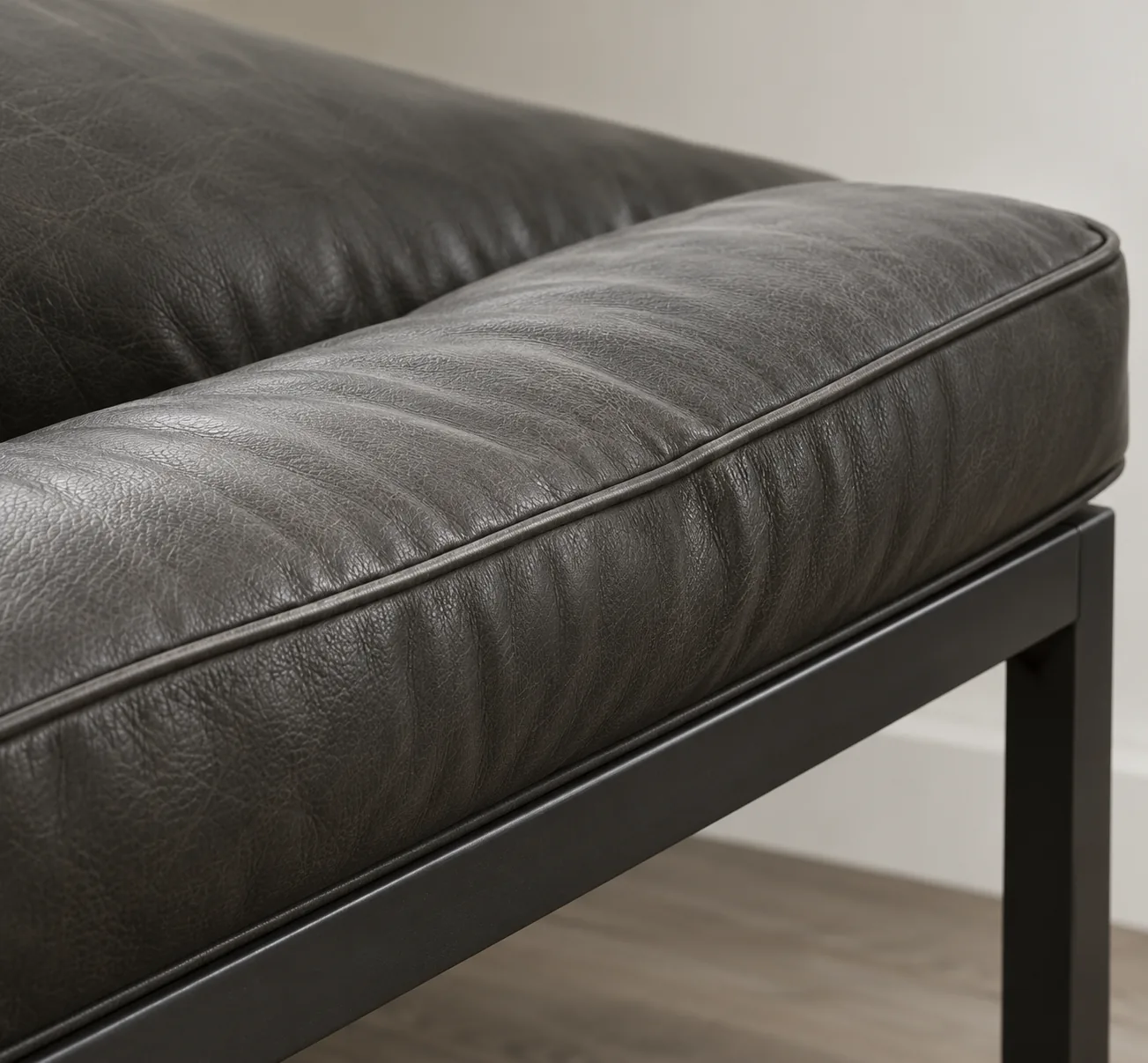 Charcoal bench recovered over a black metal frame