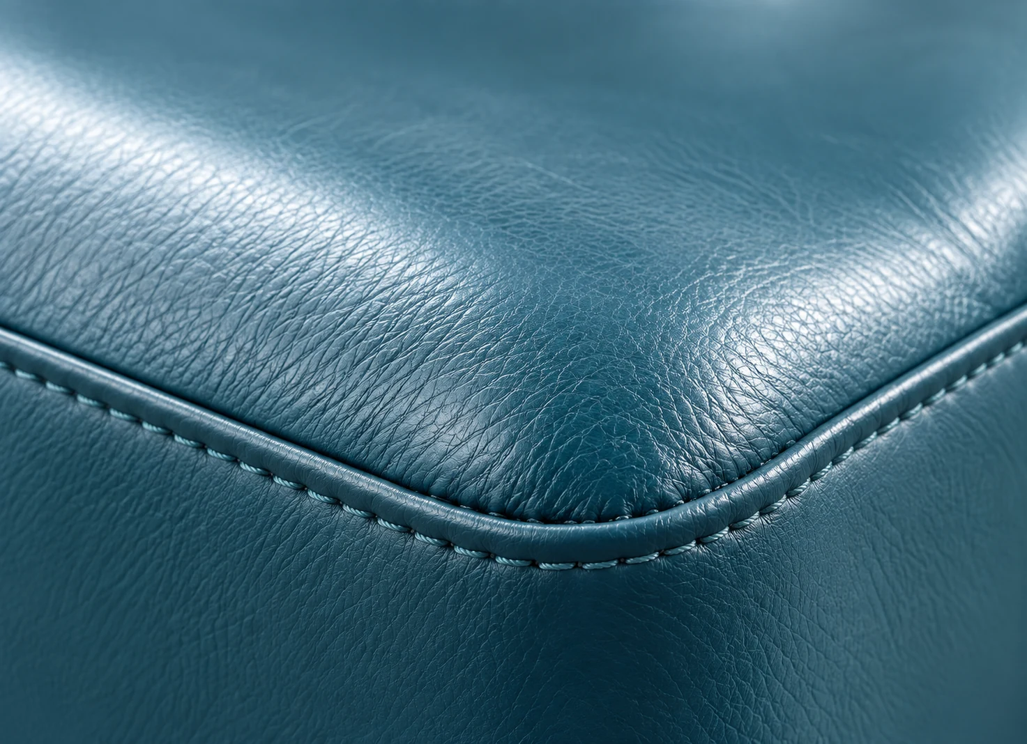 Clean stitched corner return on a treatment chair pad