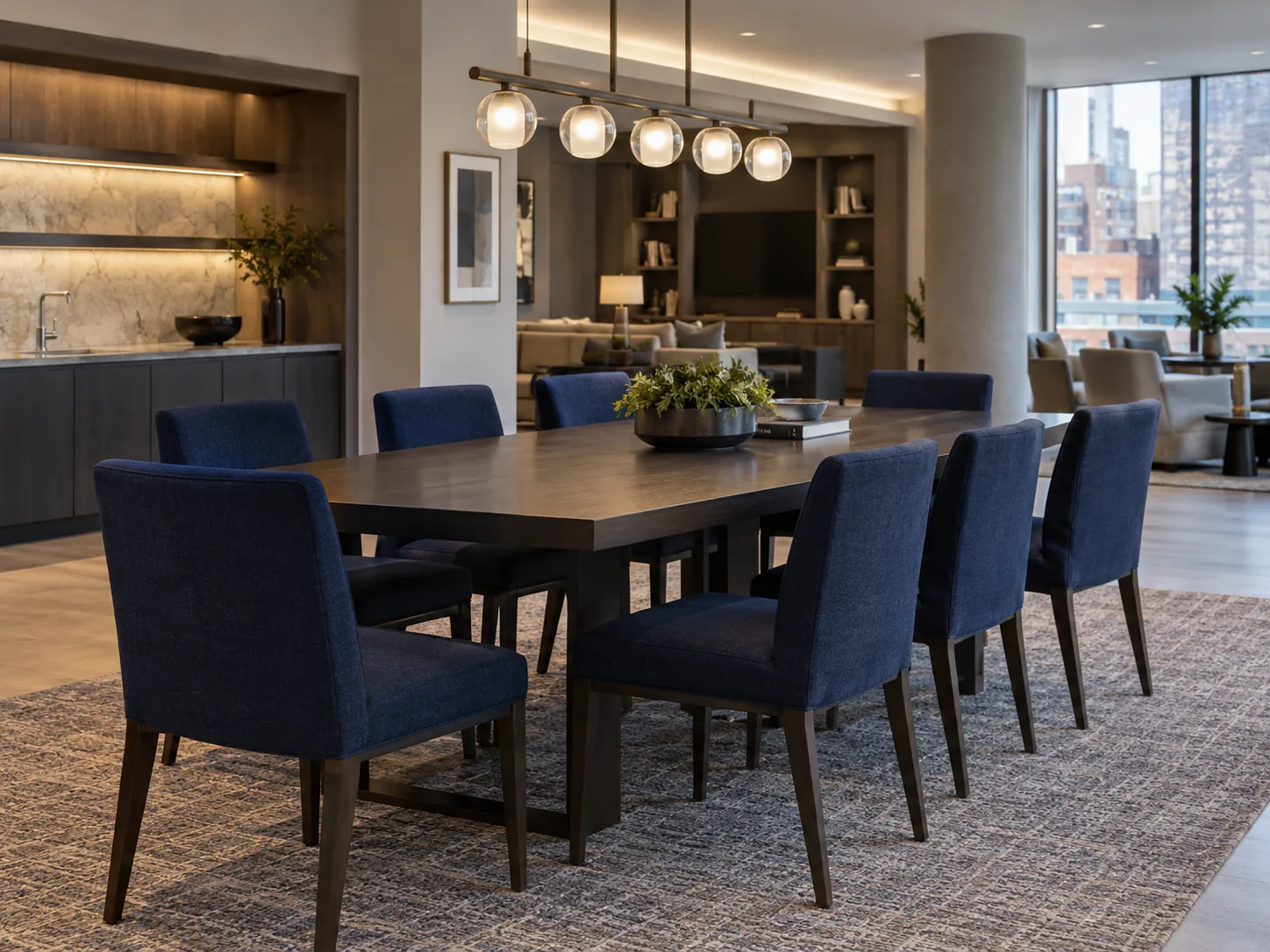 Navy fabric dining chairs around a club room table