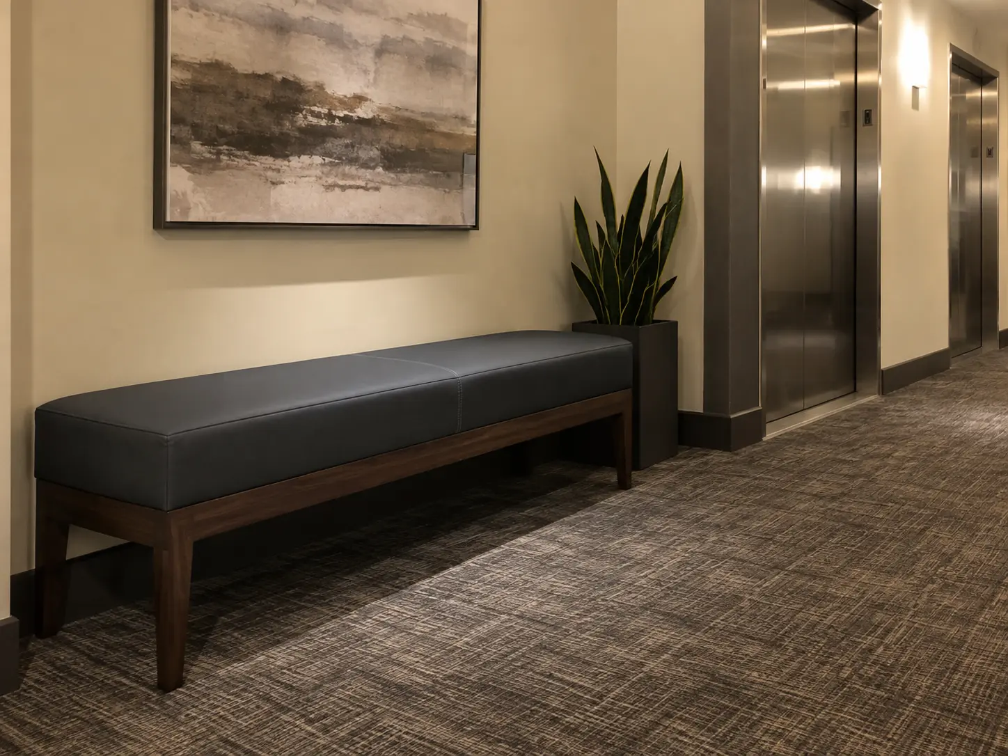A fully recovered common area bench