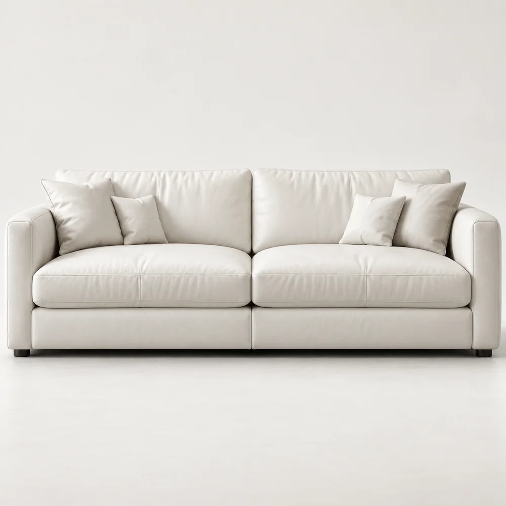 Crate & Barrel leather repair — a cream leather sofa on a low, clean-lined frame