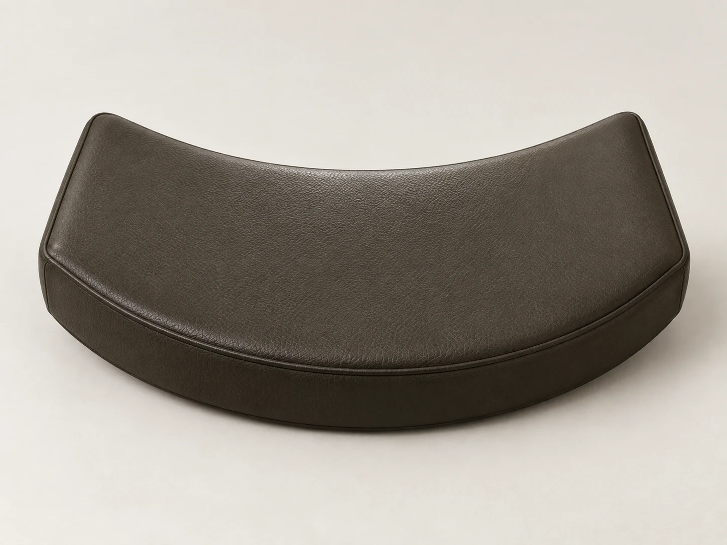 Curved seat cushion shape for a bow-fronted bench