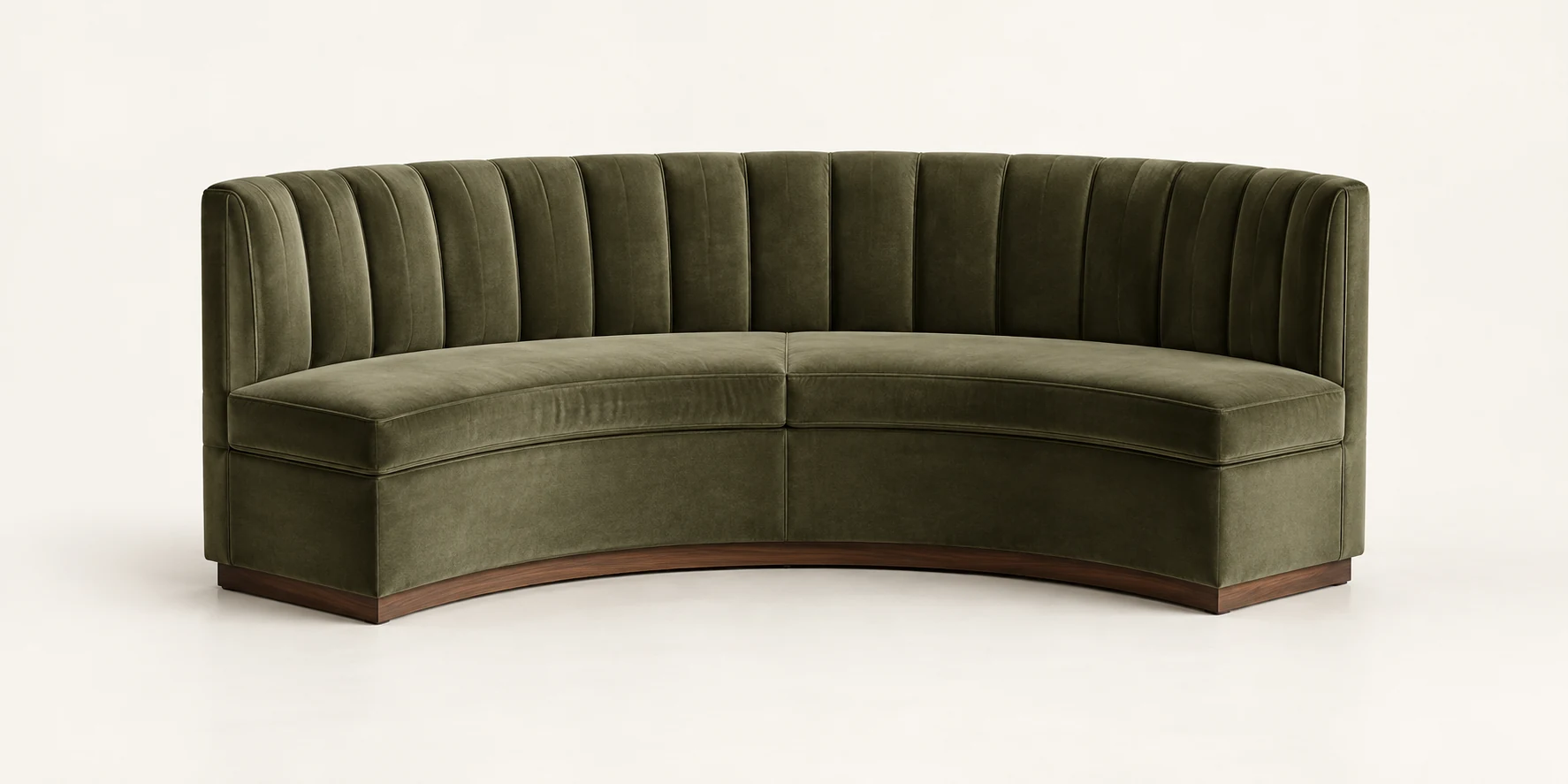 Curved banquette in green velvet built to a corner