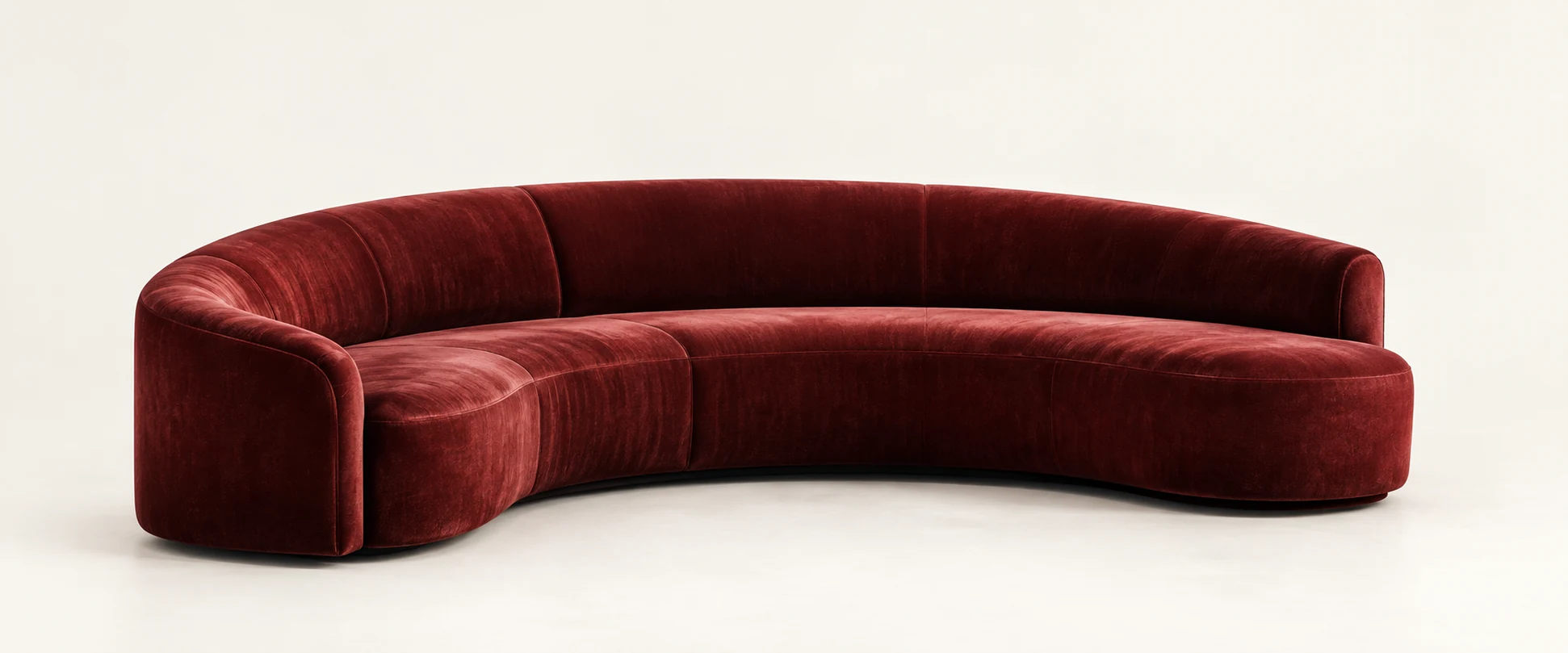 Curved sectional in burgundy velvet made to a radius