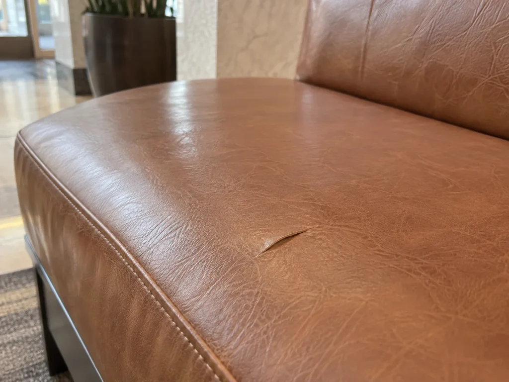 Small cut on a leather bench cushion