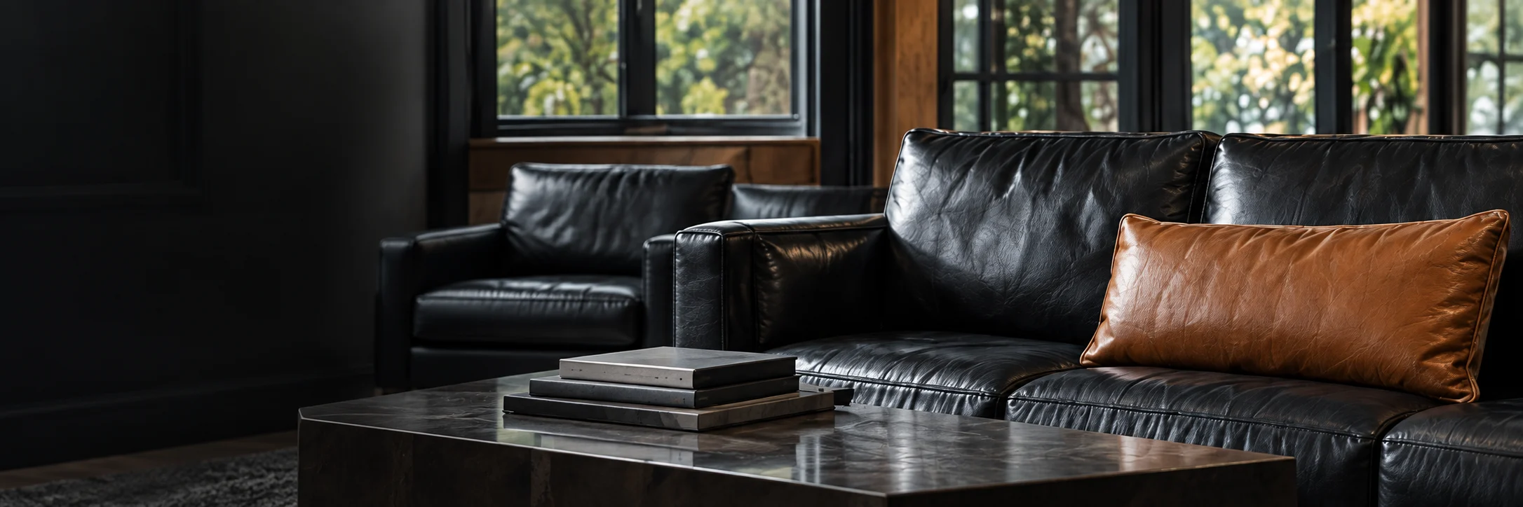 Restored lounge seating in a dark interior