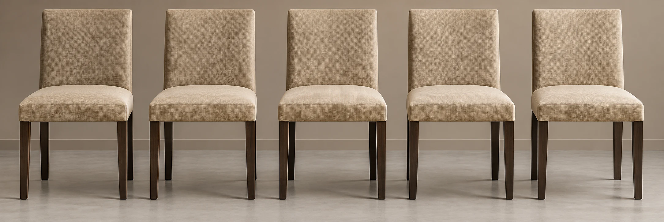 Row of dining chairs with newly upholstered seat pads