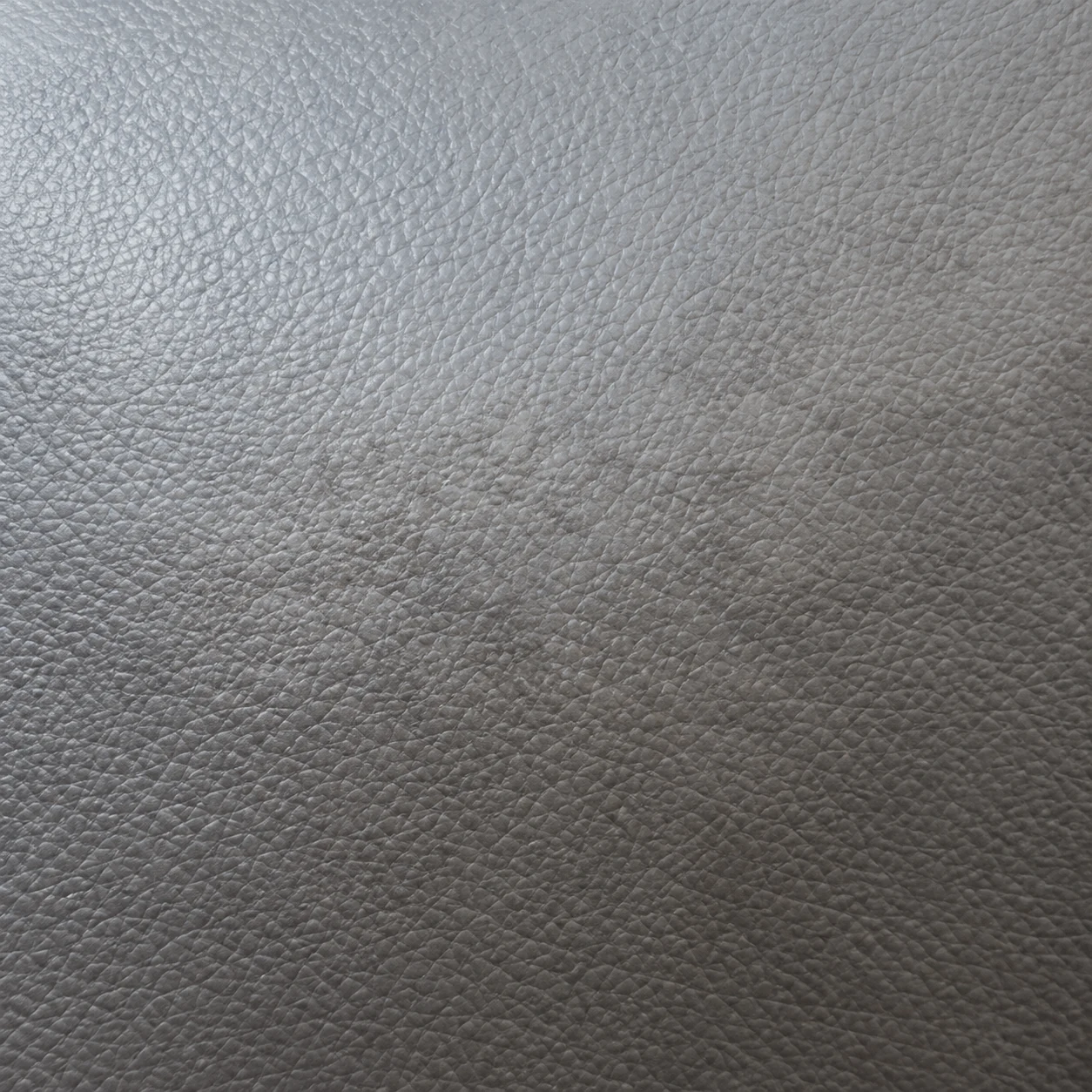 Discoloured medical vinyl with the colour wiped off the wear zone