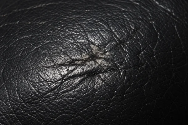 Scuffing along a leather seat edge