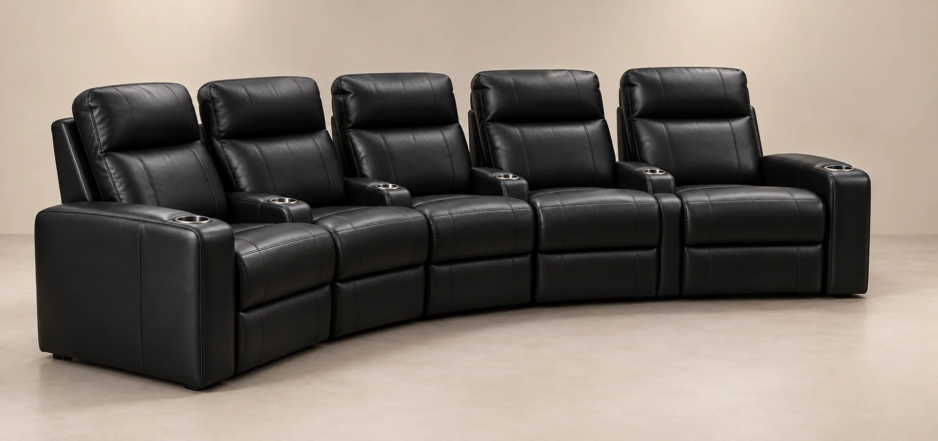Five-seat curved home theater row in black leather with consoles between each seat